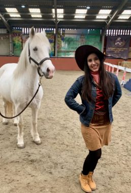 Line dance teacher with a pony
