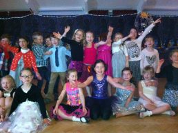 Young children posing at a party