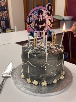 Black Wednesday Adams themed birthday cake