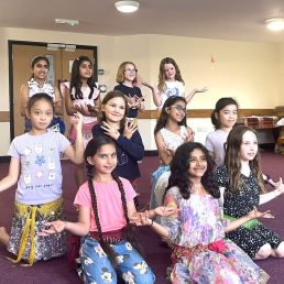 Group of girls in a Bollywood pose